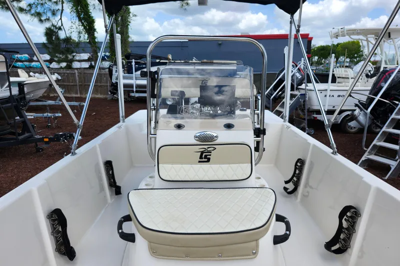 Slide: The Image of 2022 Carolina Skiff 178 JLS boat interior with steering console and seating. - 20