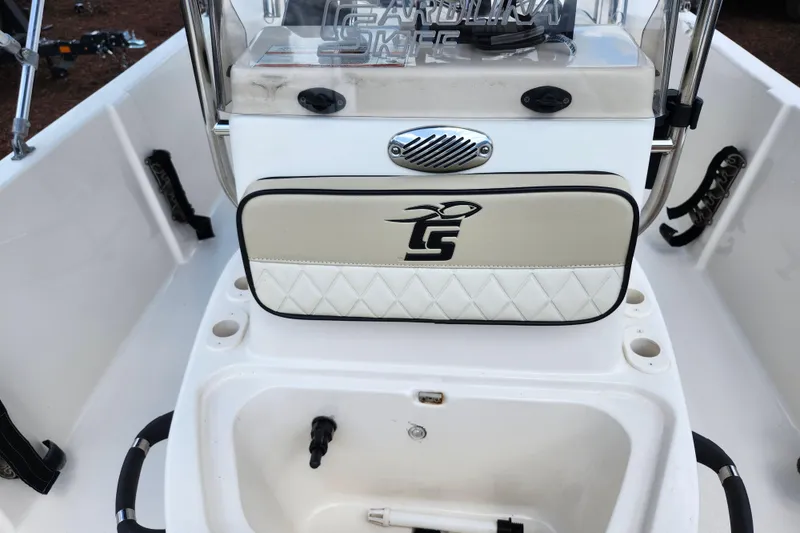 Slide: The Image of 2022 Carolina Skiff 178 JLS boat console with storage and cup holders. - 22