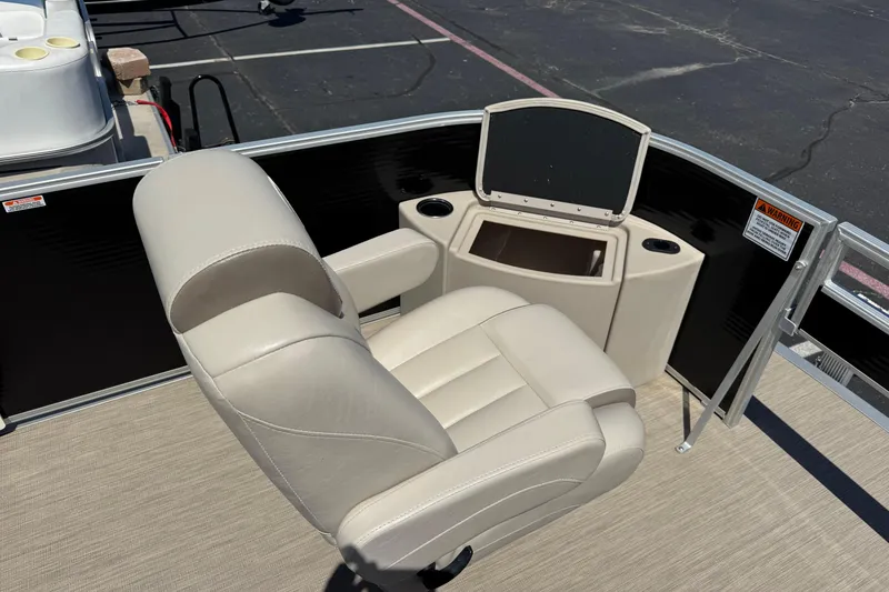 Slide: The Image of 2017 Bennington 22 SX Fish boat with beige captain's chair and console. - 4