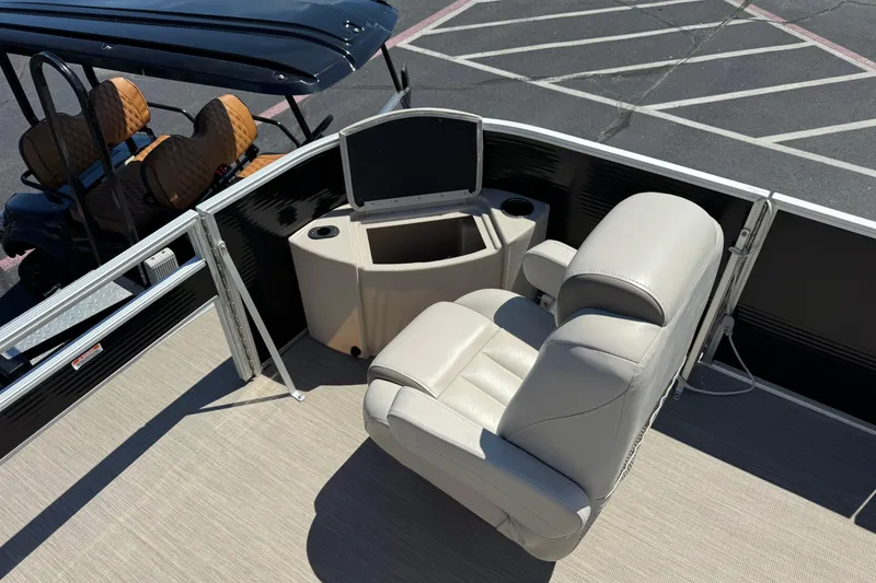 Slide: The Image of 2017 Bennington 22 SX Fish boat interior with plush seating and console. - 5