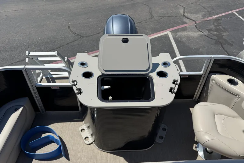 Slide: The Image of 2017 Bennington 22 SX Fish boat interior with seating and storage compartment. - 8