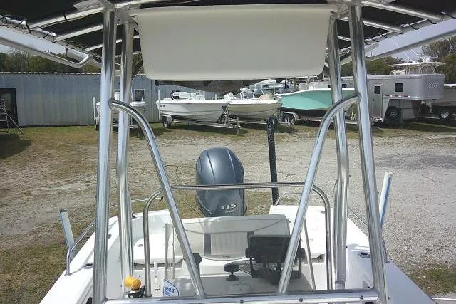 Slide: The Image of 2009 Carolina Skiff 198 DLV Elite boat with 175 HP engine in a boatyard. - 15