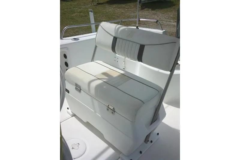 Slide: The Image of 2009 Carolina Skiff 198 DLV Elite boat seat, white upholstery, outdoor setting. - 16