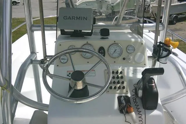 Slide: The Image of 2009 Carolina Skiff 198 DLV Elite boat console with Garmin GPS and steering wheel. - 20
