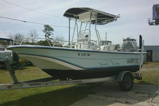 Slide: The Image of 2009 Carolina Skiff 198 DLV Elite boat on trailer, side view. - 4