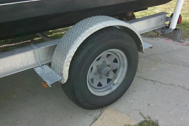 Slide: The Image of Trailer wheel of a 2009 Carolina Skiff 198 DLV Elite boat. - 6