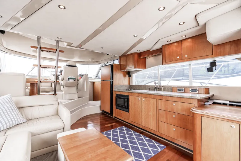 Slide: The Image of Interior of a 2001 Cruisers Yachts 5000 Sedan Sport with modern kitchen. - 15