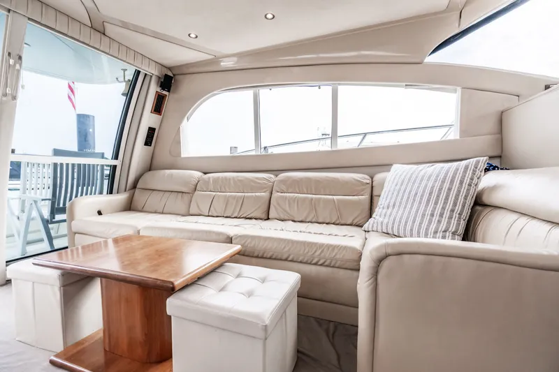 Slide: The Image of Interior of 2001 Cruisers Yachts 5000 Sedan Sport with leather sofa. - 17