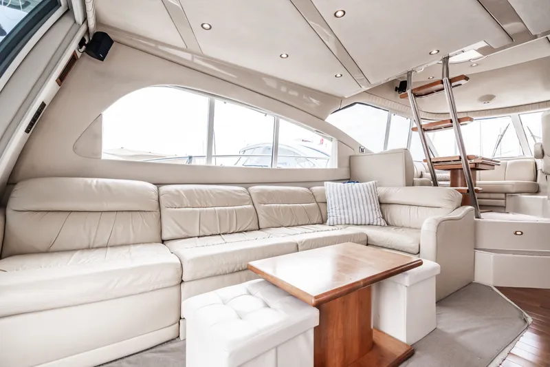 Slide: The Image of Interior of 2001 Cruisers Yachts 5000 Sedan Sport with leather sofa. - 18