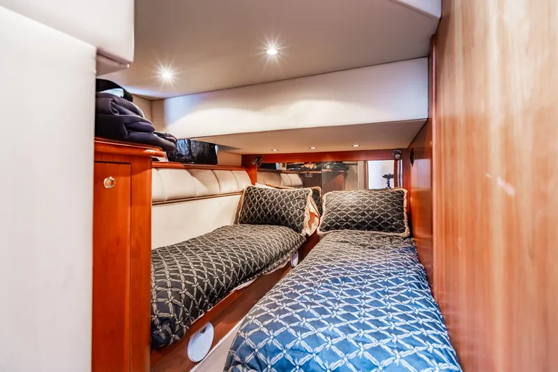 Slide: The Image of Interior of 2001 Cruisers Yachts 5000 Sedan Sport with twin beds. - 4