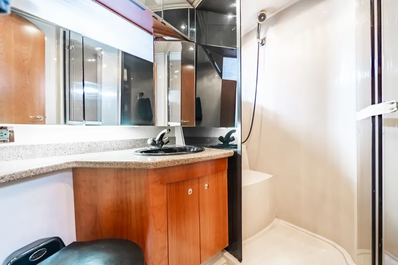 Slide: The Image of Luxurious bathroom in a 2001 Cruisers Yachts 5000 Sedan Sport. - 5