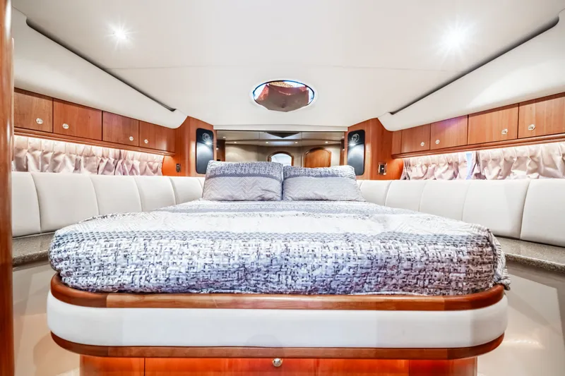 Slide: The Image of Luxurious bedroom in 2001 Cruisers Yachts 5000 Sedan Sport. - 6