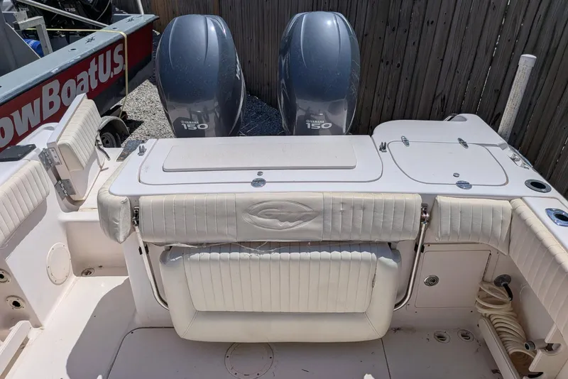 Slide: The Image of 2004 Grady-White Chase 273 boat interior with Yamaha 150 engines. - 7
