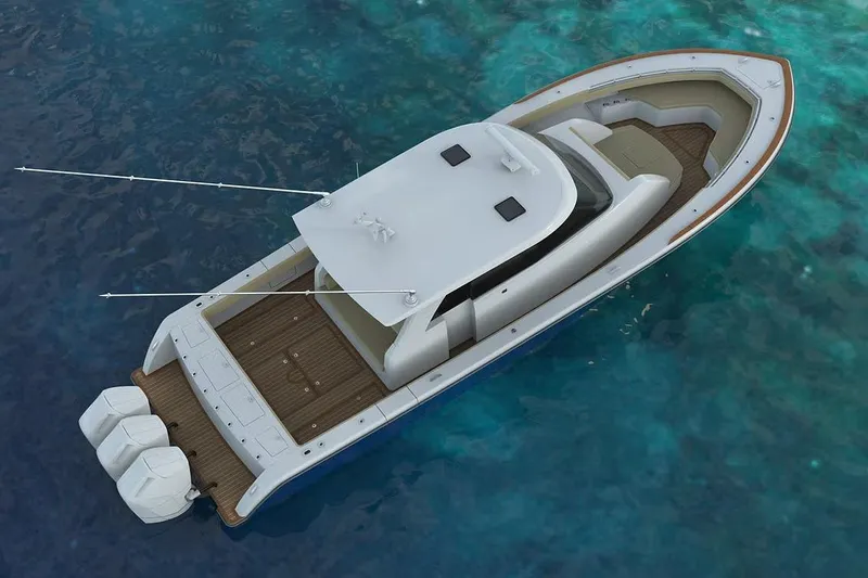 Slide: The Image of Manufacturer Provided Image: 2026 Ocean Yachts 46 CC luxury yacht on clear blue water, aerial view. - 2