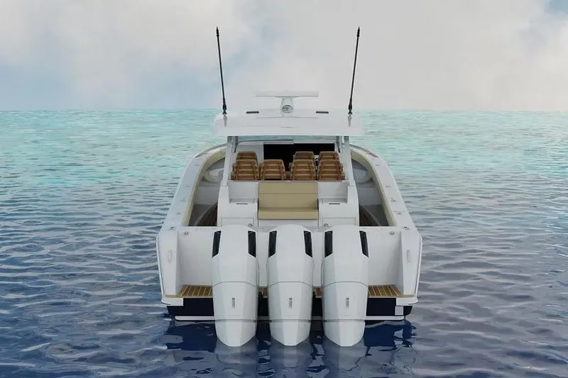 Slide: The Image of Manufacturer Provided Image: 2026 Ocean Yachts 46 Open with triple outboard engines on calm sea. - 3