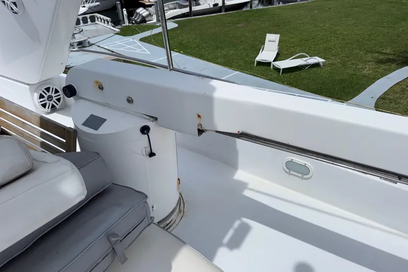 Slide: The Image of Deck area of a 1998 Azimut 85 Ultimate yacht with seating and outdoor speaker. - 16