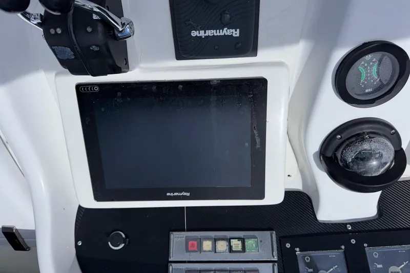 Slide: The Image of Control panel of a 1998 Azimut 85 Ultimate yacht with Raymarine display. - 17
