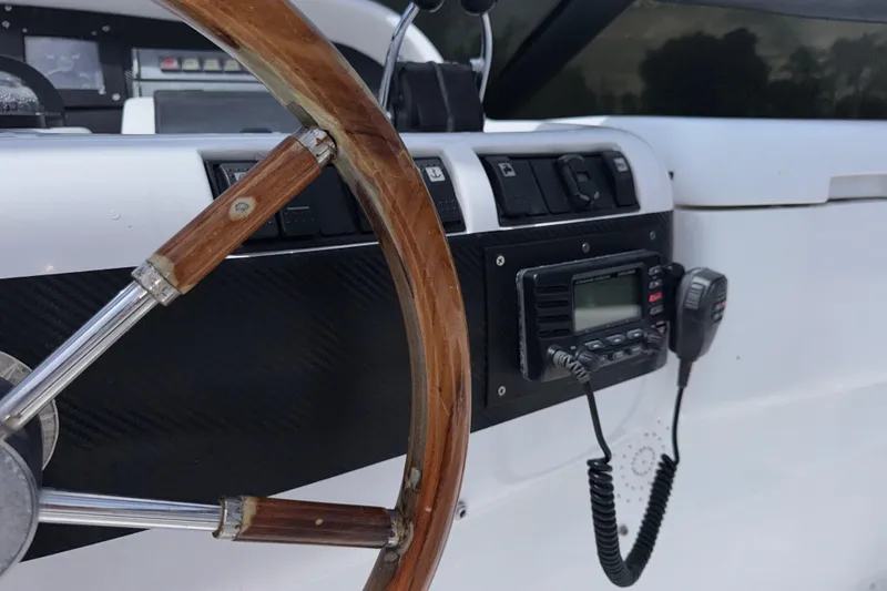 Slide: The Image of Steering wheel and control panel of 1998 Azimut 85 Ultimate yacht. - 18