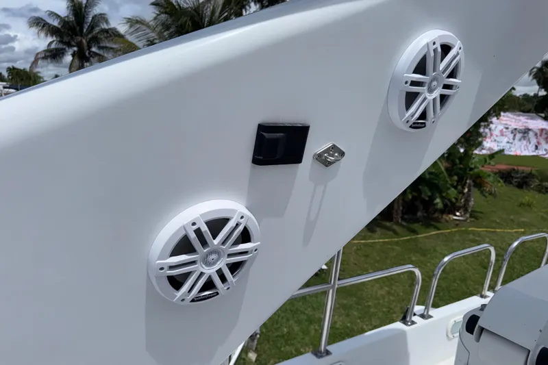 Slide: The Image of 1998 Azimut 85 Ultimate yacht speakers and railing with tropical background. - 19