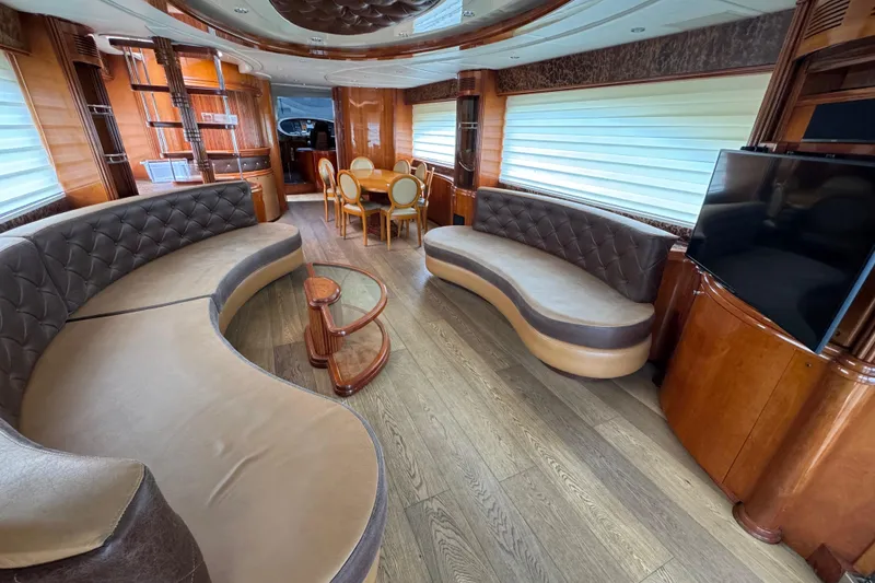 Slide: The Image of Luxurious interior of a 1998 Azimut 85 Ultimate yacht with elegant seating and dining area. - 20
