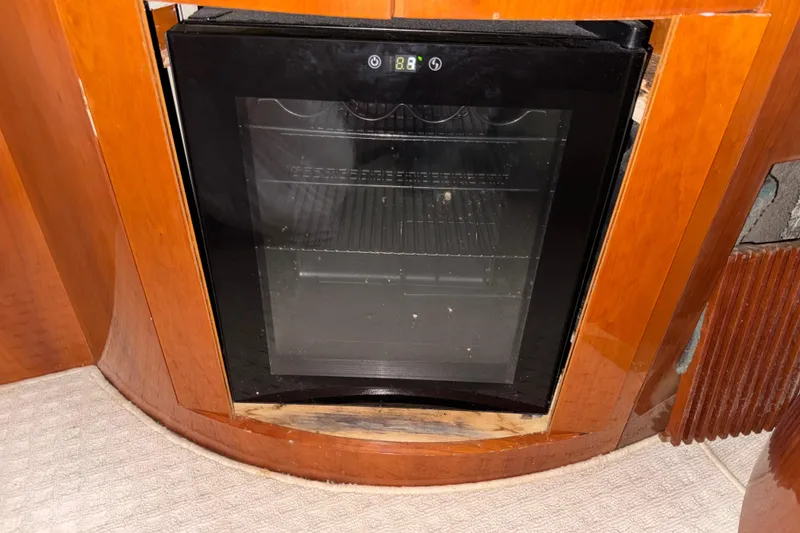 Slide: The Image of Built-in refrigerator on 1998 Azimut 85 Ultimate yacht with wooden cabinetry. - 34