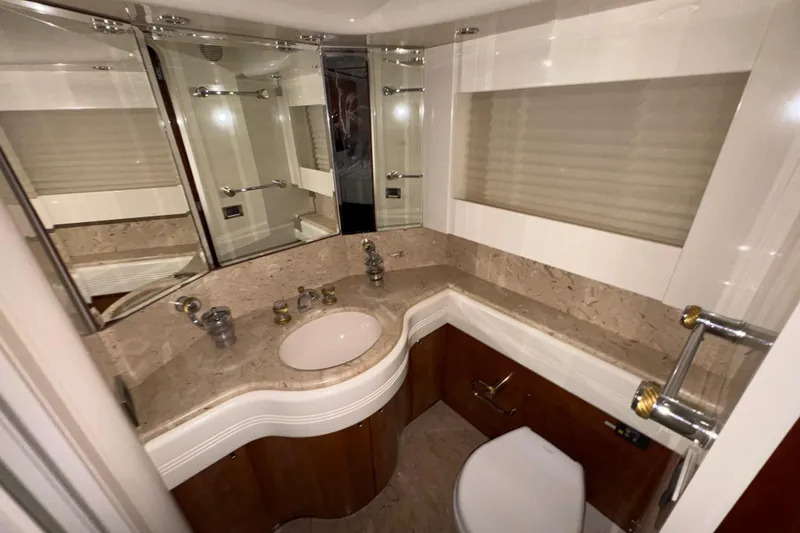 Slide: The Image of Luxurious bathroom interior of 1998 Azimut 85 Ultimate yacht with marble countertop. - 37