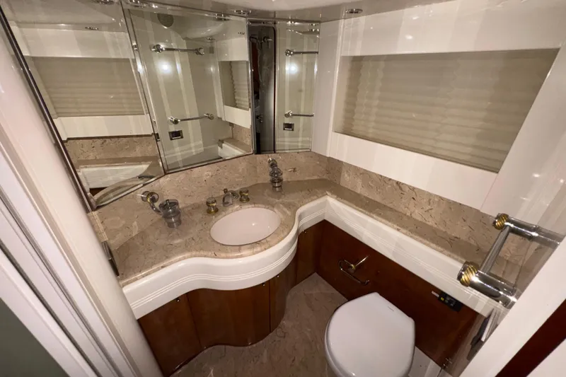 Slide: The Image of Luxurious bathroom in 1998 Azimut 85 Ultimate yacht with marble countertop and elegant fixtures. - 39