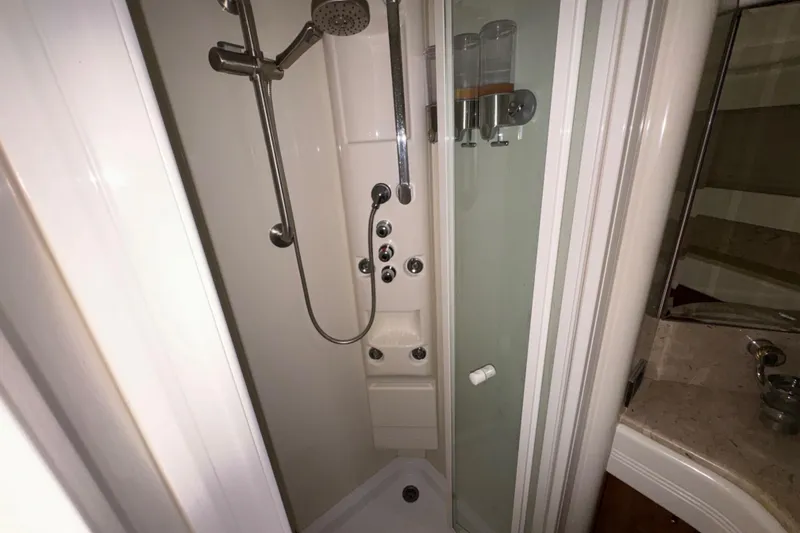 Slide: The Image of Shower area in 1998 Azimut 85 Ultimate yacht, featuring modern fixtures and dispensers. - 40