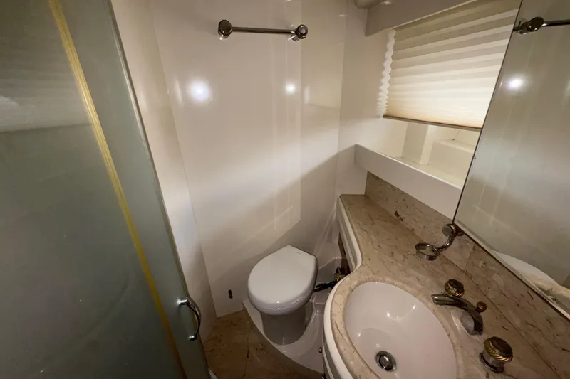 Slide: The Image of Luxurious bathroom in 1998 Azimut 85 Ultimate yacht with marble countertop and modern fixtures. - 43