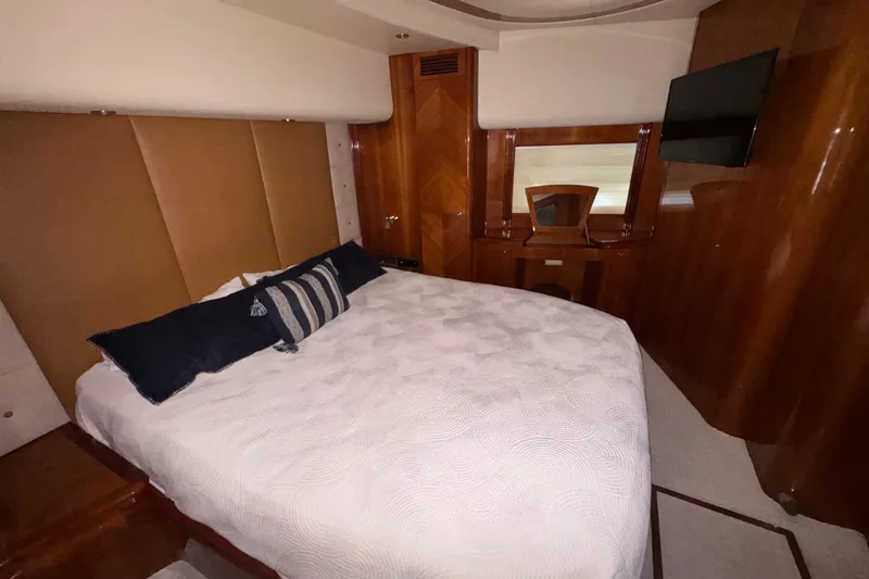 Slide: The Image of Luxurious bedroom interior of 1998 Azimut 85 Ultimate yacht with elegant wood finishes. - 45