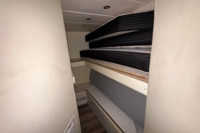 Slide: The Image of Interior cabin of 1998 Azimut 85 Ultimate yacht with stacked mattresses. - 49