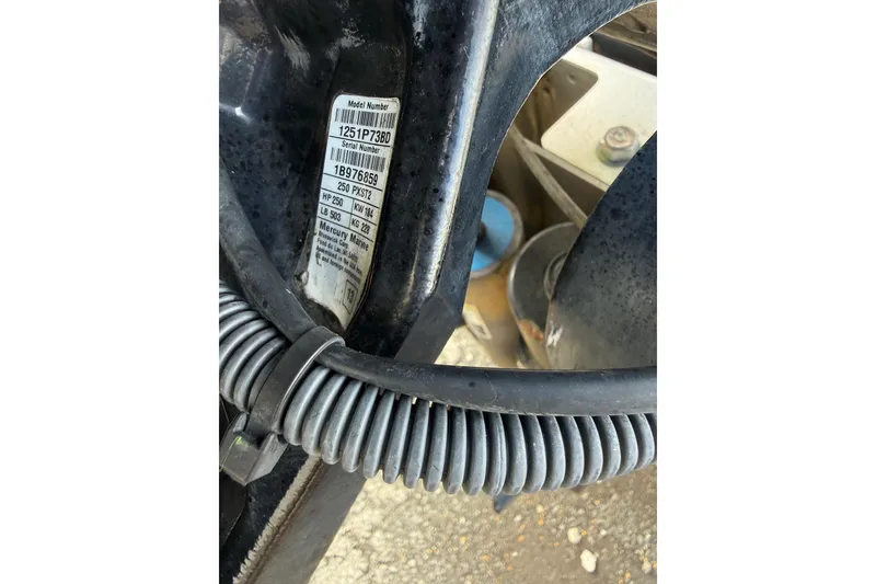 Slide: The Image of Close-up of a 2013 Ranger Z520C Carbon Comanche model number and serial label. - 40