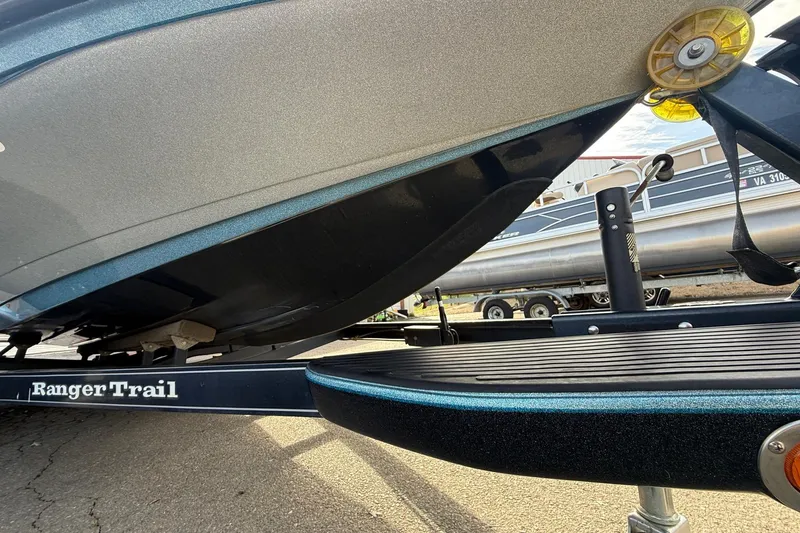 Slide: The Image of 2013 Ranger Z520C Carbon Comanche boat on Ranger Trail trailer, close-up view. - 11