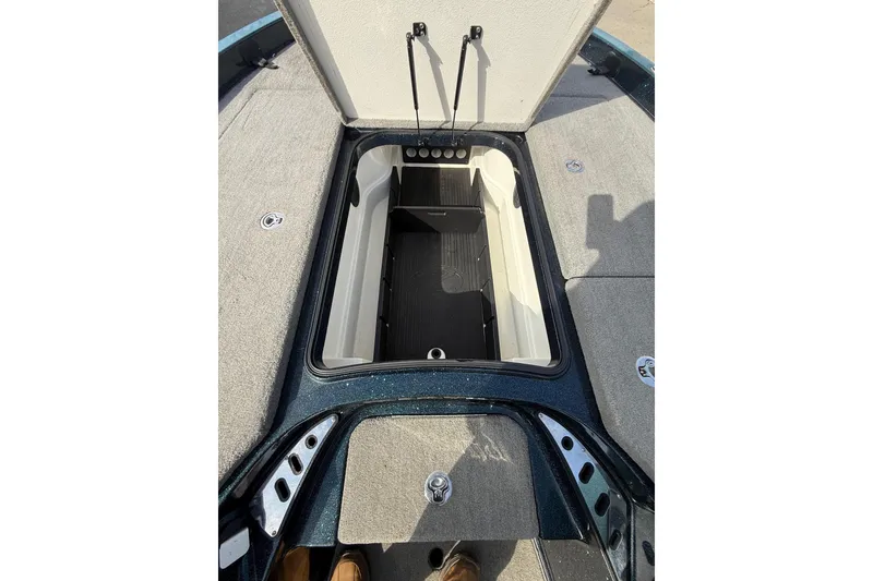 Slide: The Image of Open storage compartment on 2013 Ranger Z520C Carbon Comanche boat deck. - 28