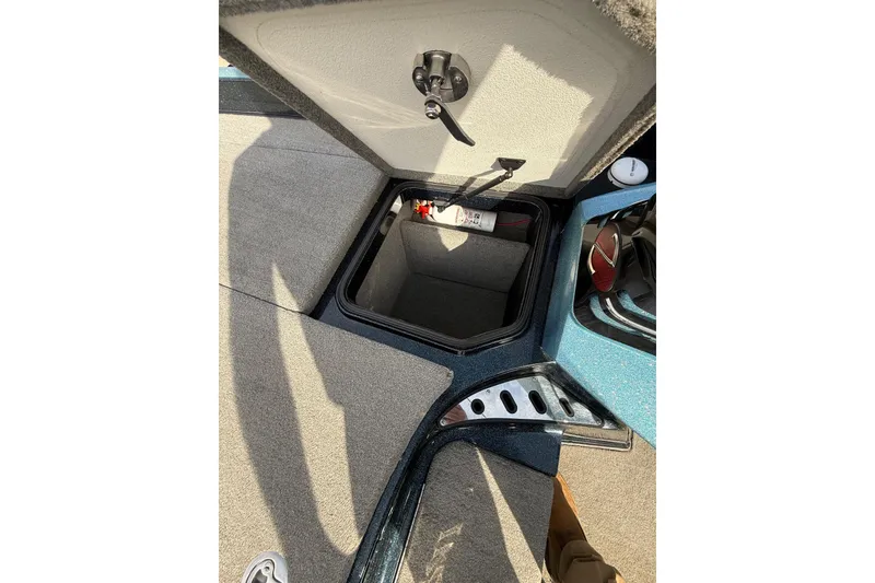 Slide: The Image of Open storage compartment in 2013 Ranger Z520C Carbon Comanche boat. - 30