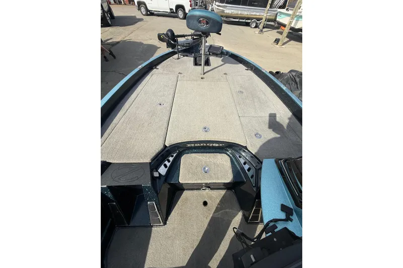 Slide: The Image of 2013 Ranger Z520C Carbon Comanche boat deck with seating and storage compartments. - 31