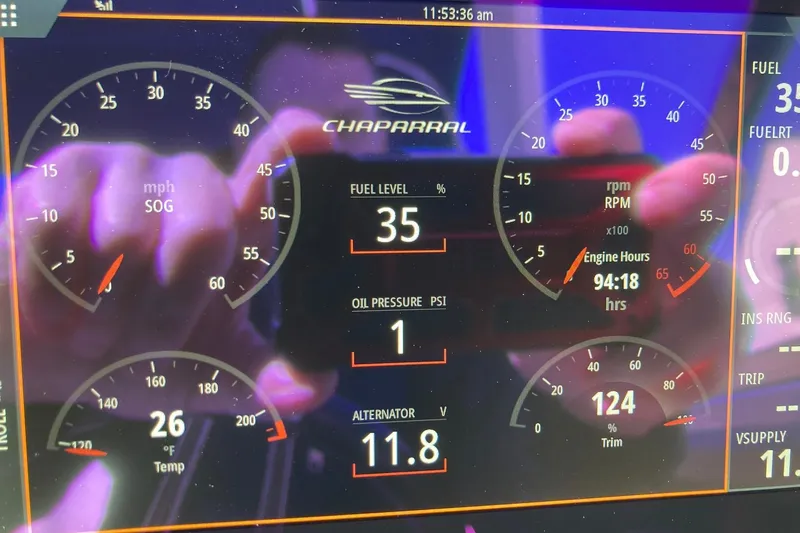 Slide: The Image of Dashboard of 2022 Chaparral 267 SSX OB showing fuel, RPM, and engine metrics. - 15