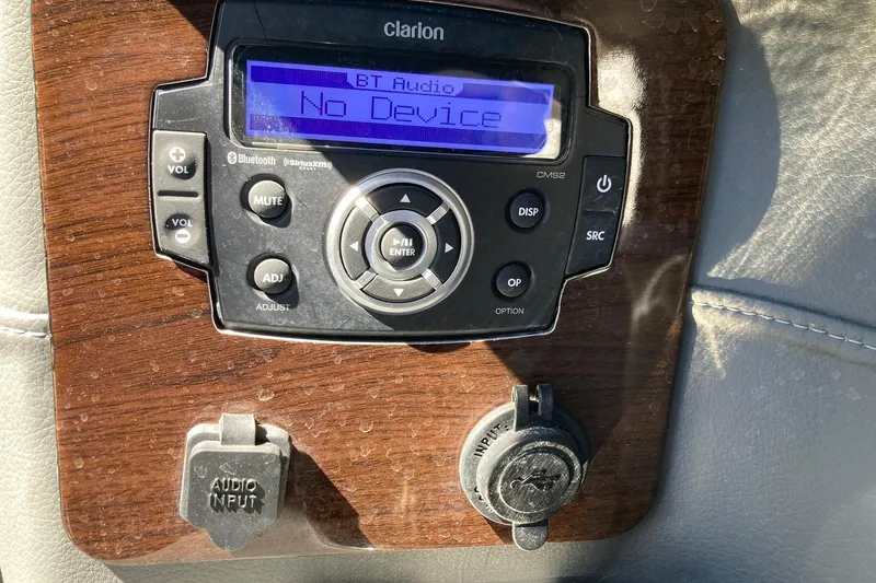 Slide: The Image of Audio control panel on 2022 Chaparral 267 SSX OB boat, displaying "No Device." - 17