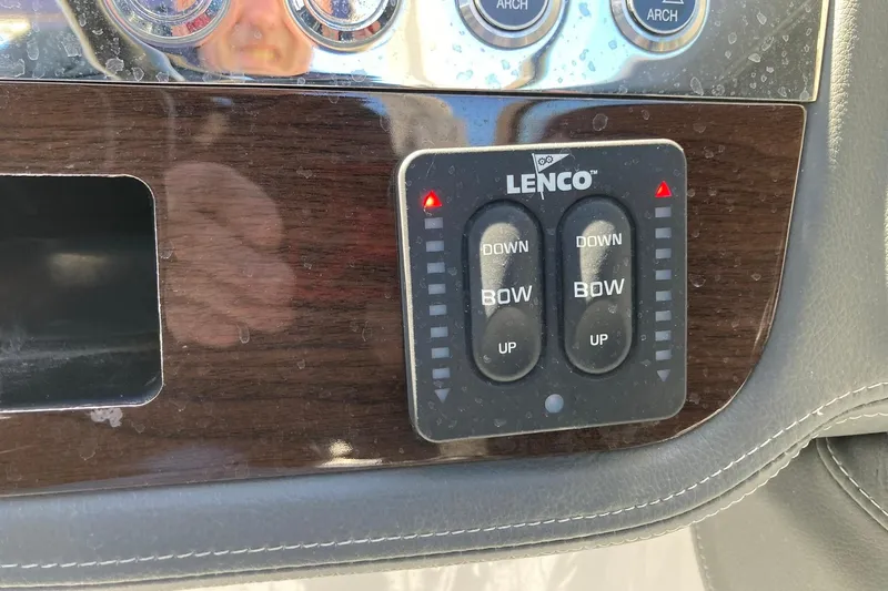 Slide: The Image of Control panel of a 2022 Chaparral 267 SSX OB boat with Lenco trim tabs. - 18