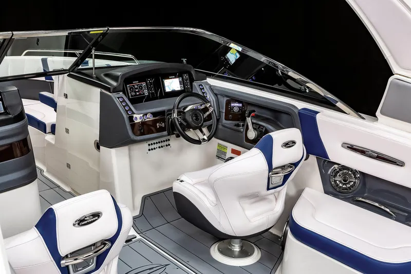 Slide: The Image of Manufacturer Provided Image: 2022 Chaparral 267 SSX OB boat interior with modern dashboard and seating. - 32
