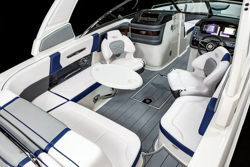 Slide: The Image of Manufacturer Provided Image: Interior of 2022 Chaparral 267 SSX OB boat with luxurious seating and modern dashboard. - 34