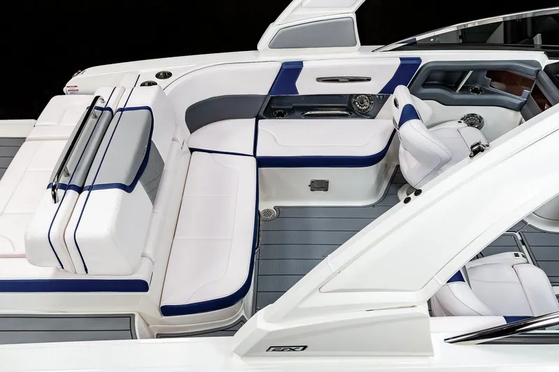 Slide: The Image of Manufacturer Provided Image: 2022 Chaparral 267 SSX OB boat interior with white and blue seating. - 36