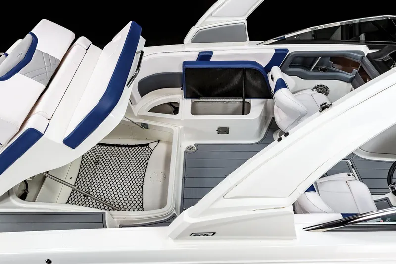 Slide: The Image of Manufacturer Provided Image: 2022 Chaparral 267 SSX OB boat interior with seating and storage compartments. - 39