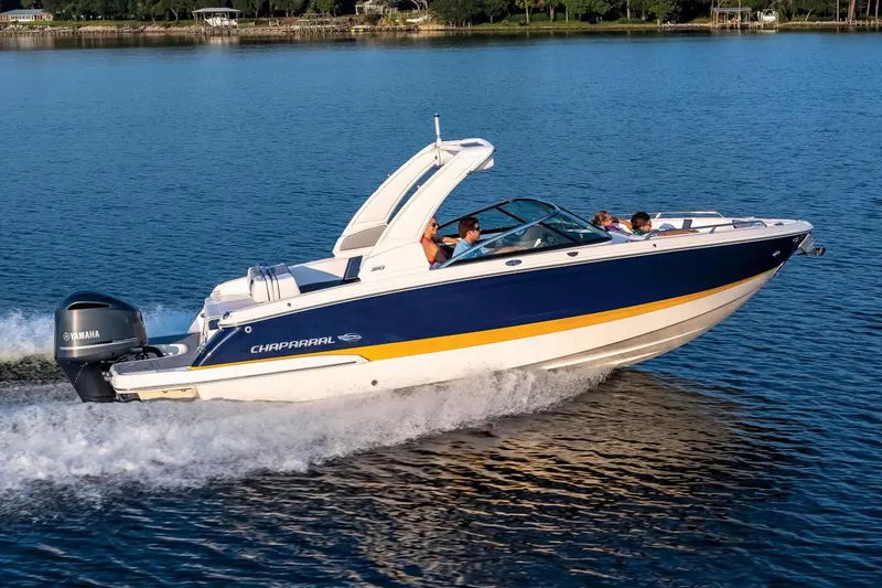 Slide: The Image of Manufacturer Provided Image: 2022 Chaparral 267 SSX OB speedboat cruising on a lake. - 4