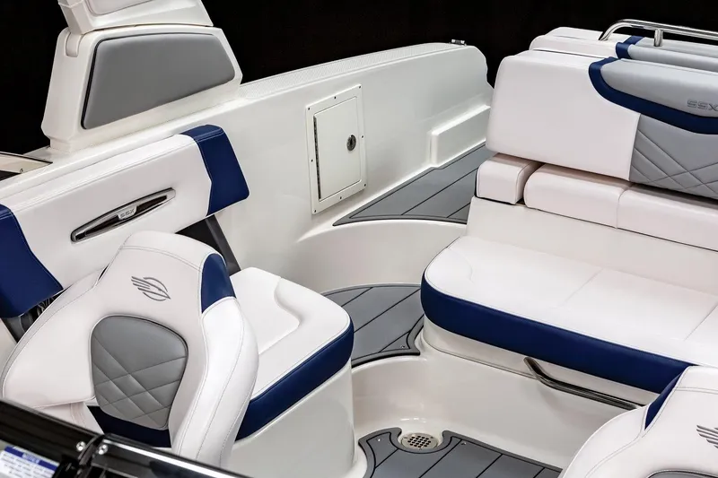 Slide: The Image of Manufacturer Provided Image: Interior seating of 2022 Chaparral 267 SSX OB boat with white and blue upholstery. - 40