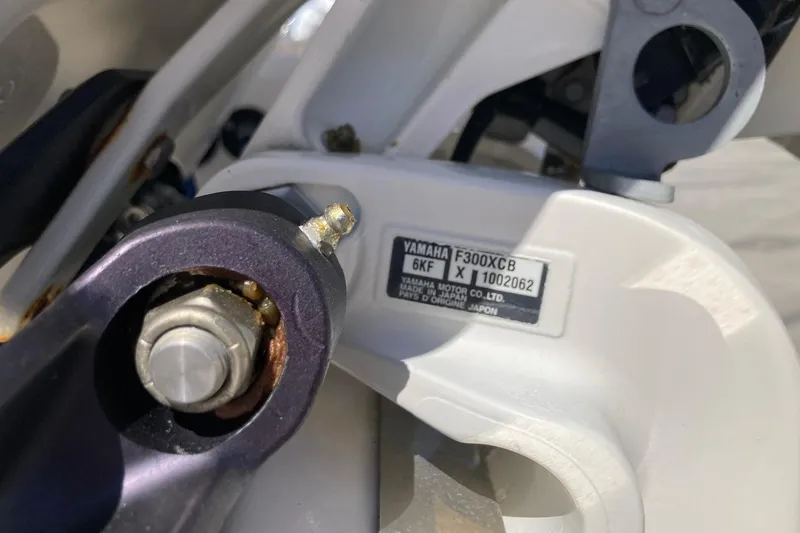 Slide: The Image of Close-up of Yamaha F300XCB engine part on 2022 Chaparral 267 SSX OB boat. - 7