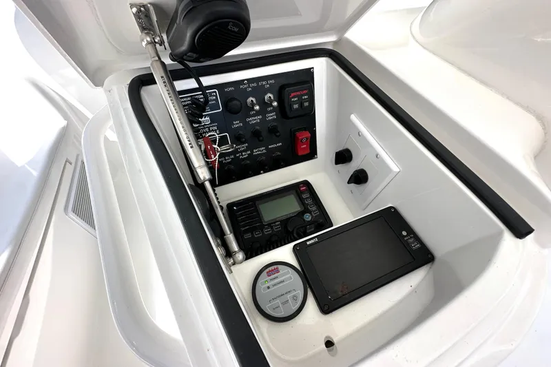 Slide: The Image of Control panel of a 2012 Viking 42 Open boat with navigation and communication equipment. - 17