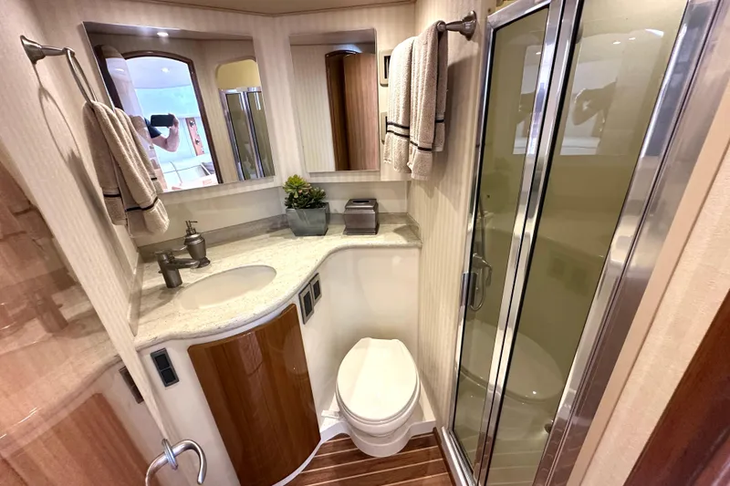 Slide: The Image of Luxurious bathroom in 2012 Viking 42 Open yacht with modern fixtures and elegant design. - 29