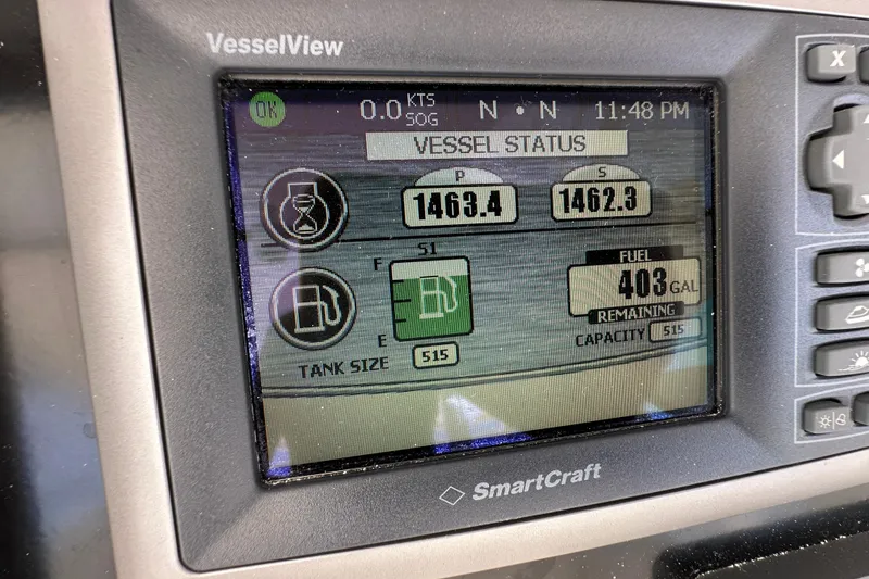 Slide: The Image of VesselView display on 2012 Viking 42 Open showing fuel status and engine hours. - 32
