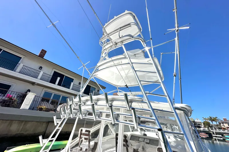 Slide: The Image of 2012 Viking 42 Open yacht with tower against clear blue sky. - 8